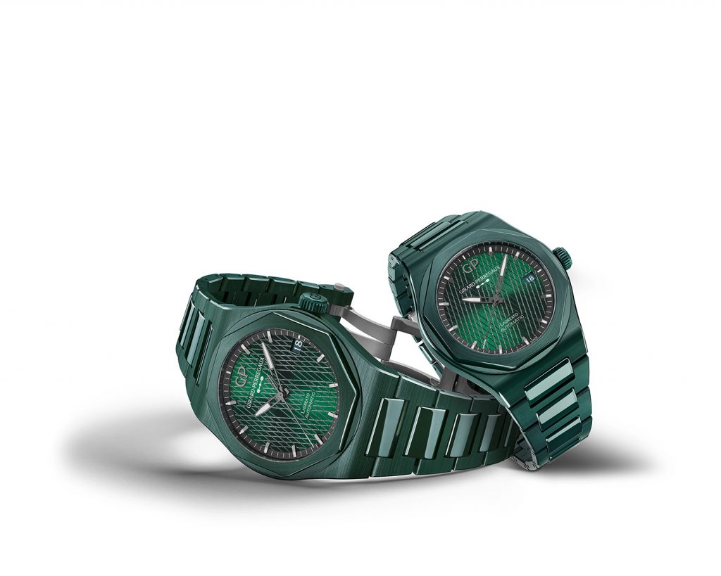 A pair of green ceramic watches