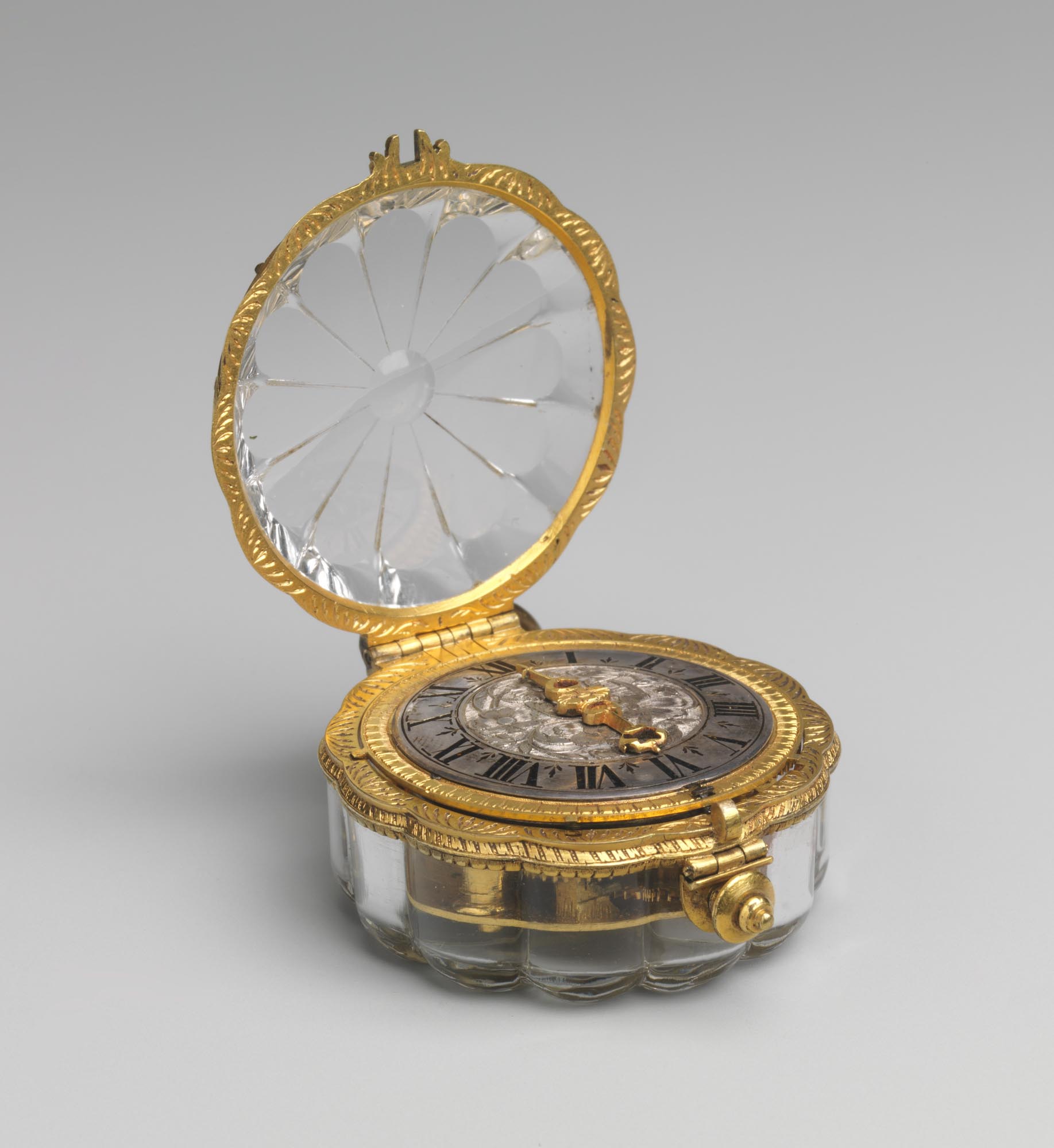 Rock Crystal Mounted in Gilded Brass Watch by Jean Rousseau (ca. 1650 – 60)