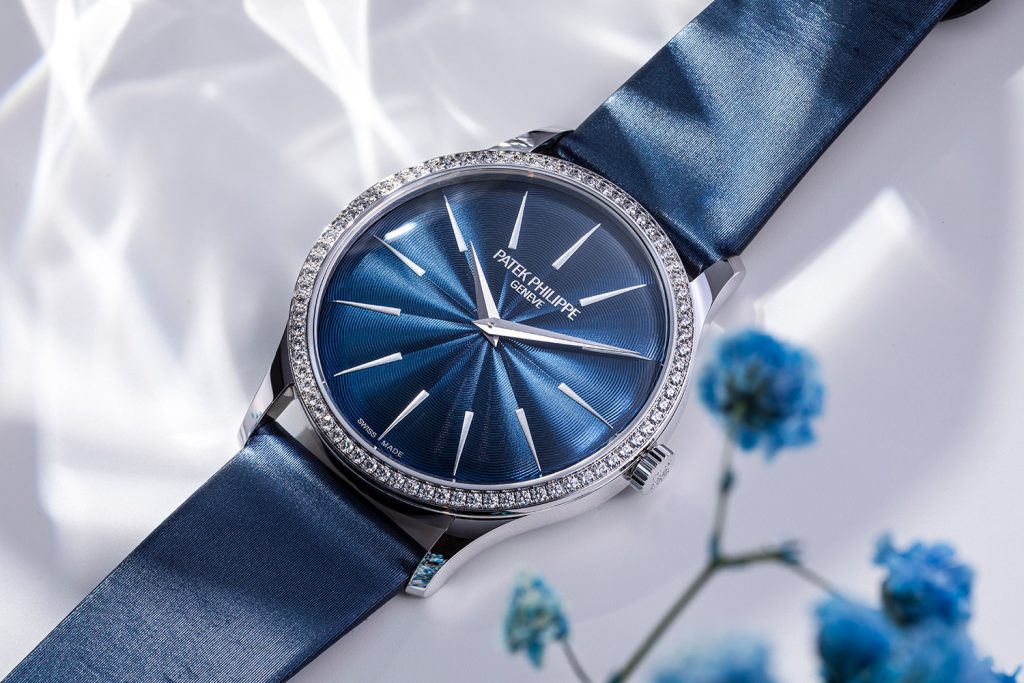 White gold watch with diamond bezel and guilloche lacquer midnight blue dial