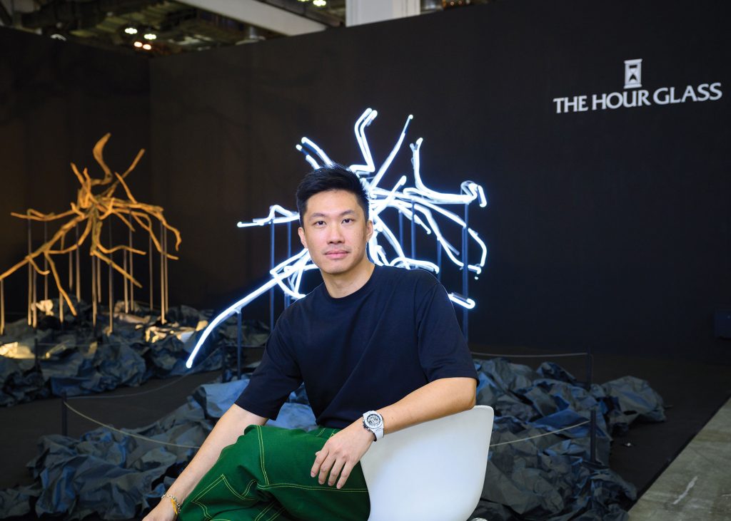 light installation based on reconstructed mangrove roots against black backdrop