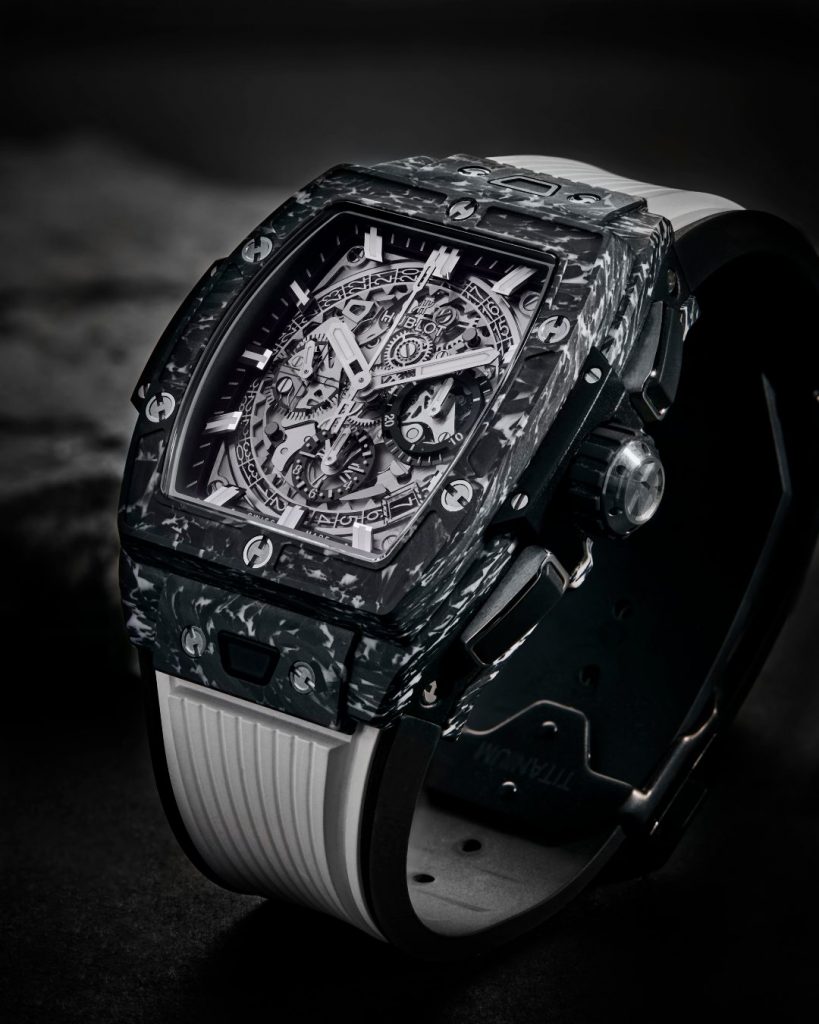 Carbon fibre tonneau-shaped tourbillon skeleton watch with white rubber strap