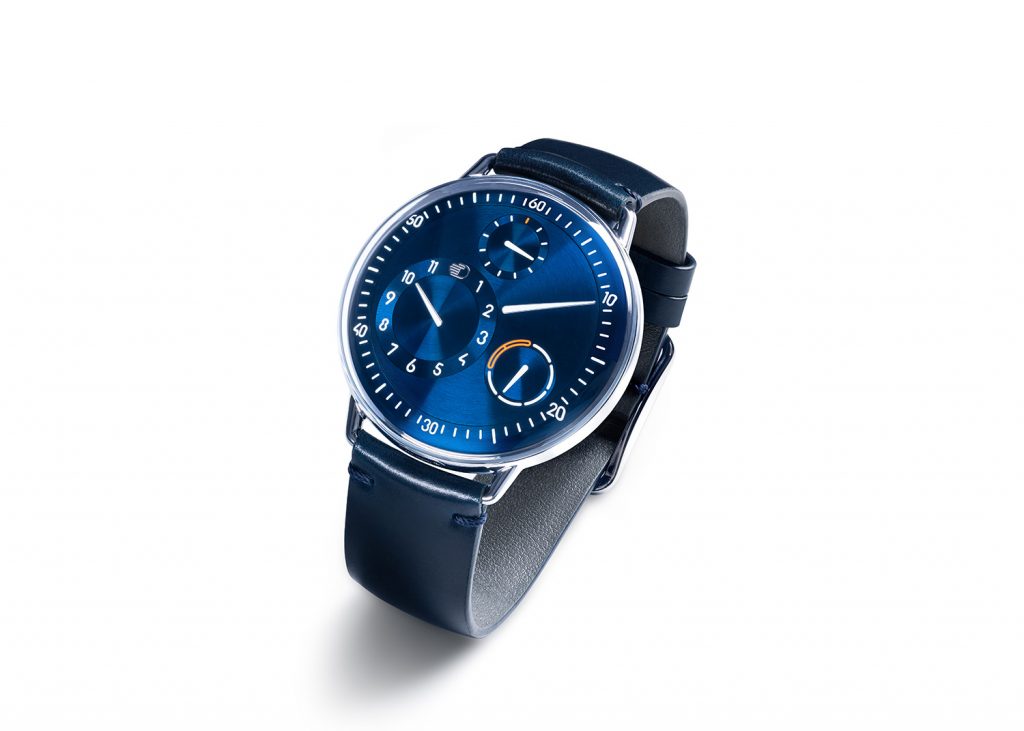 Titanium case watch with blue dial and no crown