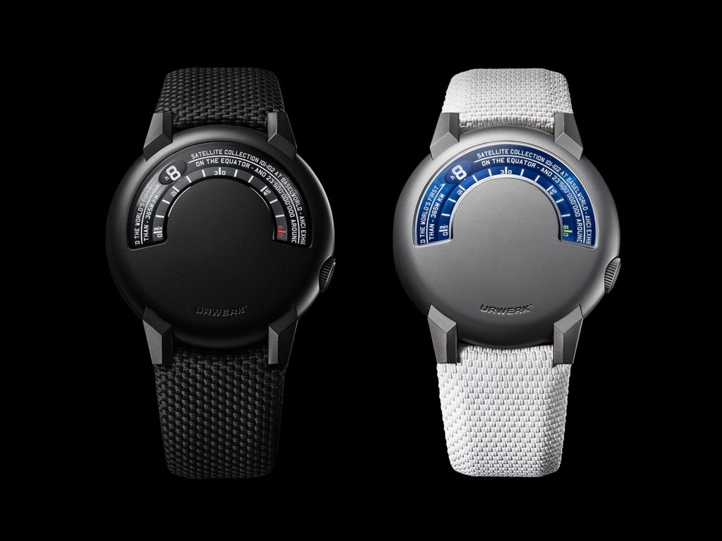 Black watch on black strap and titanium watch on white strap