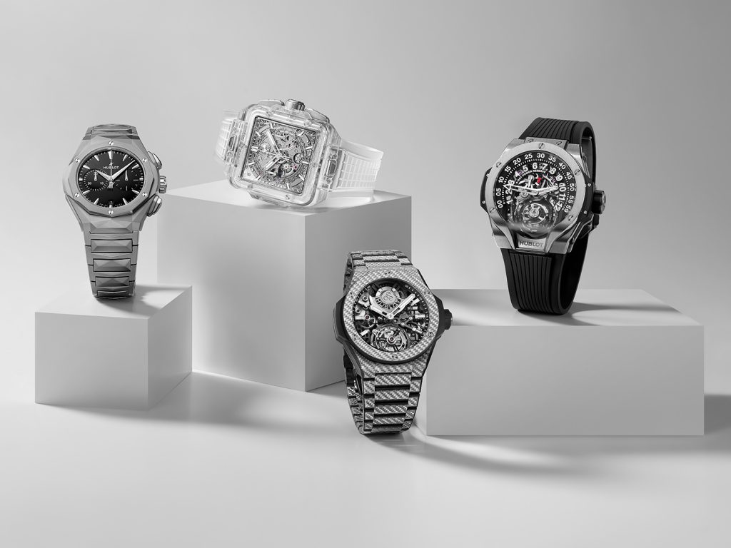 Four watches against a white background