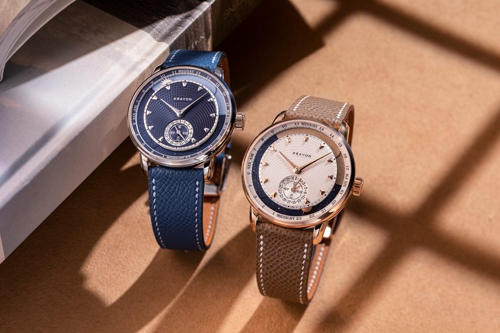 A pair of Krayon Anywhere watches, in white gold with blue dial and rose gold with cream dial