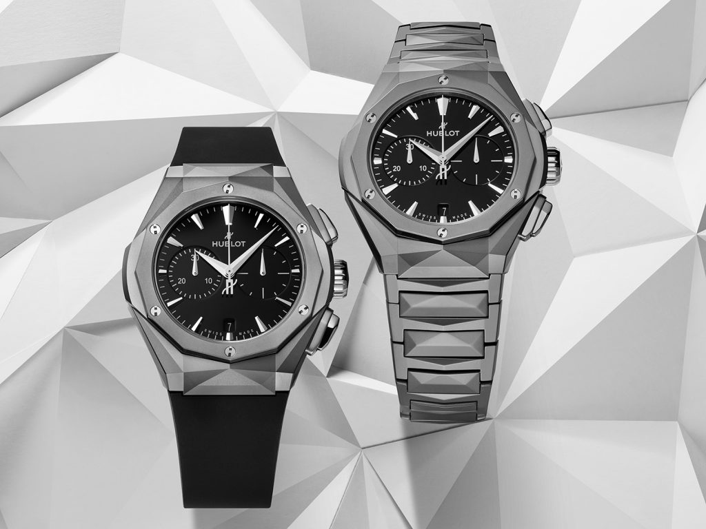 Two titanium chronograph watches with black dials
