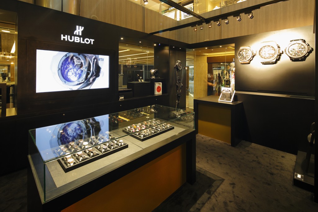 Replete with black counters and Hublot wall clocks