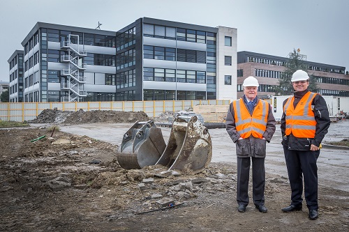 Mr. Philippe Stern, Honorary President and Mr. Thierry Stern, President at the site of the proposed new building.