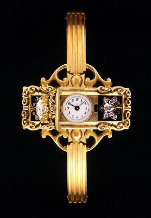 The face of the beautiful wristwatch made for Countess Koscowicz. Note the diamonds and intricate ornamental carvings. (Image Credit: Patek Philippe Museum).