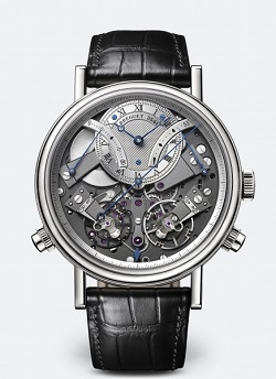 The Breguet Tradition Chronographe Independent 7077 in 18-carat white gold with delicately fluted case band, dial in silvered 18-carat gold and power reserve indicator at 2 o’clock. 